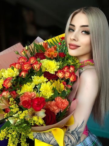 Тая